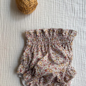 Cubrepañal roja pastel