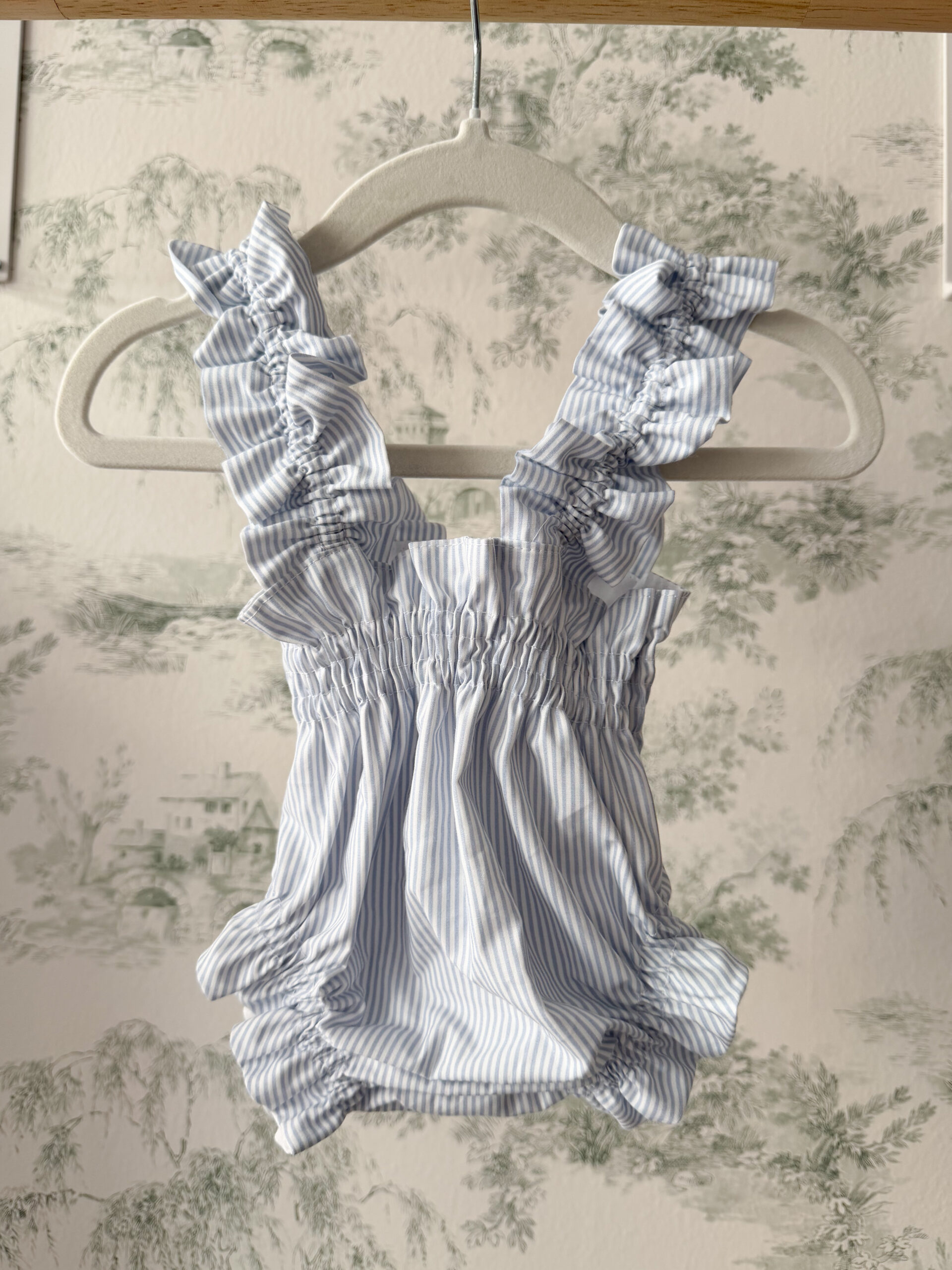 Cubre rayas celeste tirantes fruncidos