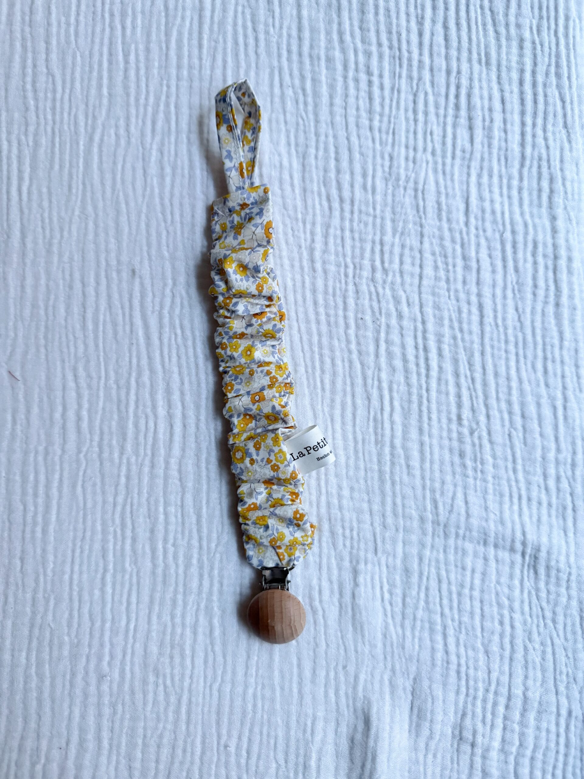 Chupetero flor amarilla